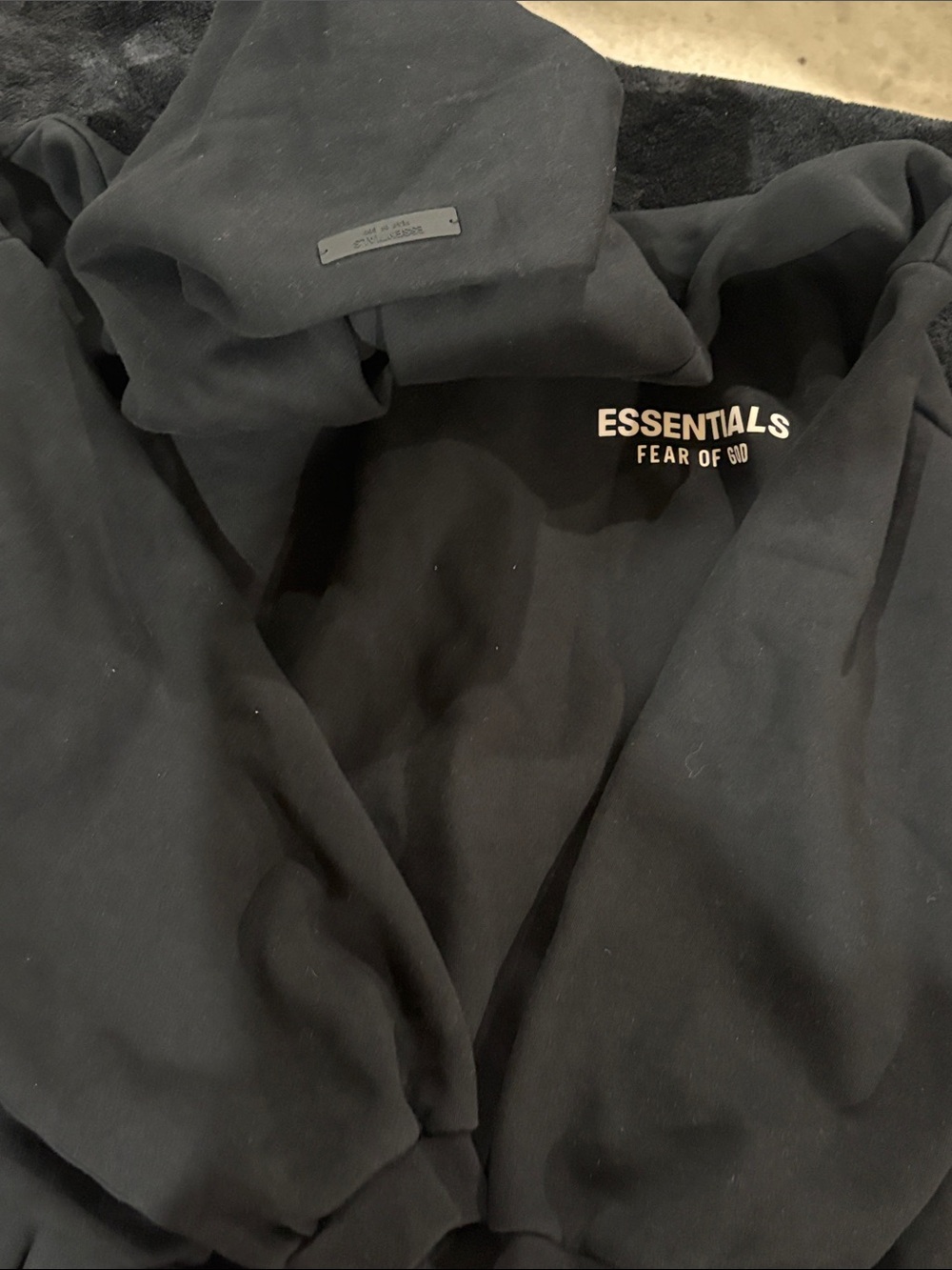 Essentials Teddy Jacket in Black with White Logo size medium